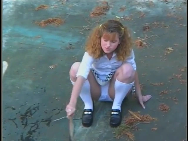 Naughty redhead babysitter gets fucked from behind while sucking a black cock