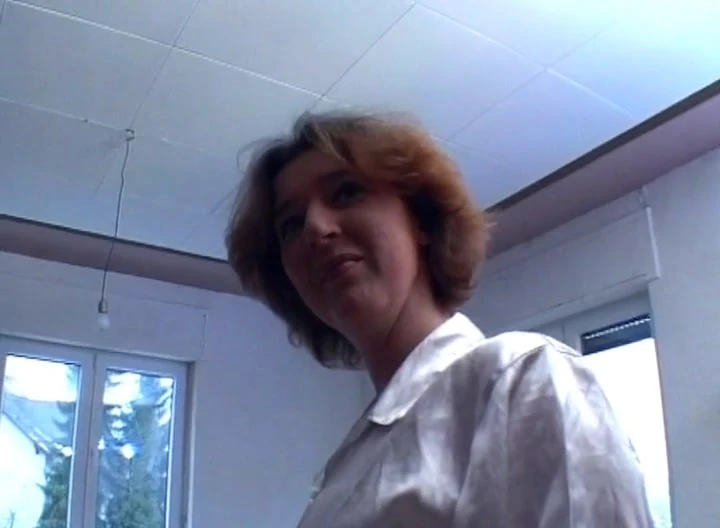 A super hot lady from Germany tickling her pussy with her dildo